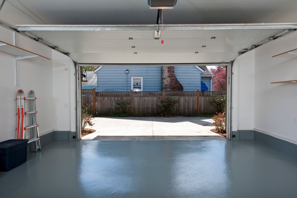 Clean residential garage with smooth epoxy coated floor