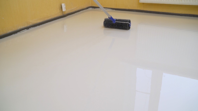 Glossy epoxy floor coating applied by Custom Floor Coatings in Jacksonville and St Augustine, FL